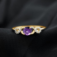 Natural amethyst engagement ring with diamond infinity knot by Rosec Jewels, featuring a purple amethyst gemstone and intricate design.