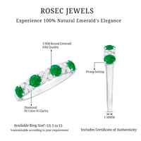 Natural emerald and diamond half eternity ring by Rosec Jewels featuring green emeralds and sparkling diamonds on a sleek band.