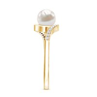 Freshwater pearl solitaire engagement ring by Rosec Jewels featuring a bypass design with diamond accent on a silver band.
