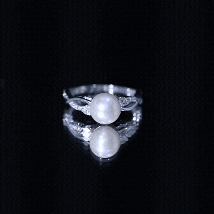 Genuine 7.4 carat freshwater pearl engagement ring with diamond crossover shank by Rosec Jewels, featuring a elegant white pearl.
