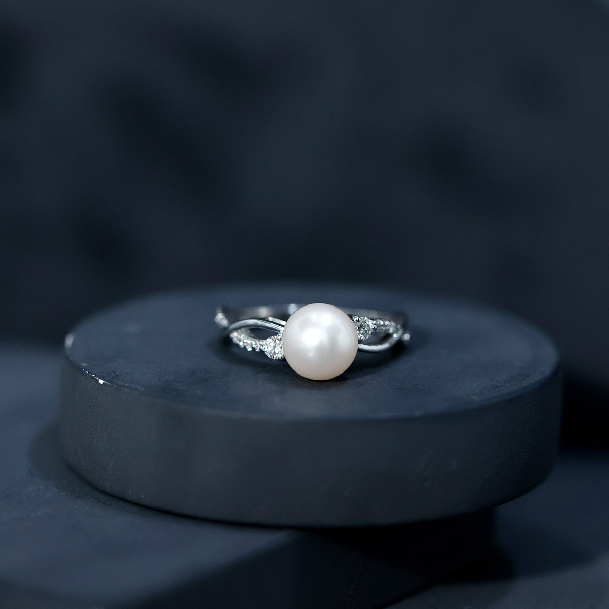 Genuine 7.4 carat freshwater pearl engagement ring with diamond crossover shank by Rosec Jewels, showcasing elegant jewelry design.