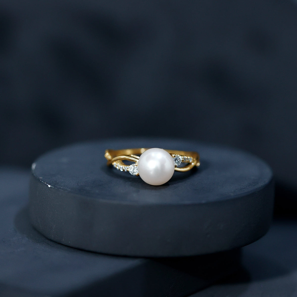 Genuine 7.4 carat freshwater pearl engagement ring with diamond crossover shank by Rosec Jewels, showcasing elegant gold band and intricate design.