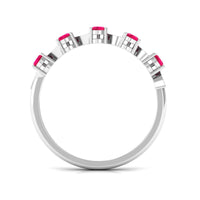 Pear-shaped ruby half eternity ring with diamonds for women, featuring rose gold band from Rosec Jewels.