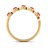 Pear-shaped ruby half eternity ring with diamonds for women, featuring rose gold band from Rosec Jewels.
