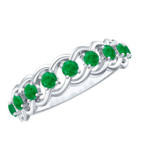 Genuine green emerald braided half eternity ring from Rosec Jewels featuring a gold band with emerald inlay.