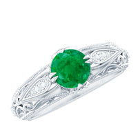 Natural emerald and diamond antique-style engagement ring by Rosec Jewels with intricate design and vintage-inspired details.