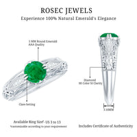 Antique-style engagement ring with natural emerald and diamonds, featuring intricate design from Rosec Jewels.