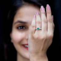 Natural emerald diamond antique engagement ring by Rosec Jewels featuring a vibrant emerald gemstone and intricate vintage design.