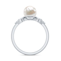 Nature-inspired 3-carat freshwater pearl engagement ring with diamonds by Rosec Jewels, featuring intricate floral design.