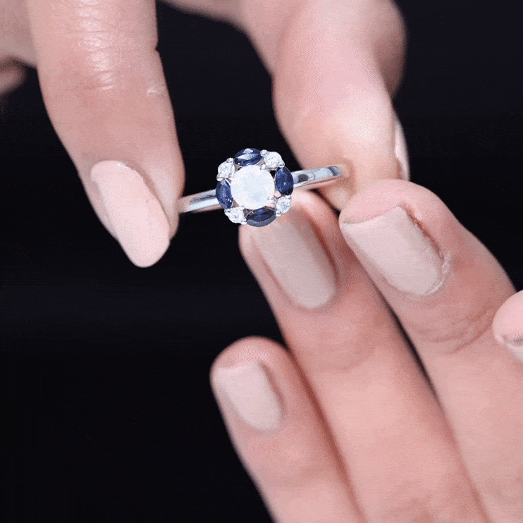 Natural Ethiopian Opal and sapphire designer ring from Rosec Jewels, featuring vibrant gemstones and intricate metalwork.