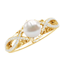 Cultured 2 Carat freshwater pearl solitaire engagement ring with diamond crossover shank by Rosec Jewels, showcasing a elegant ring design.