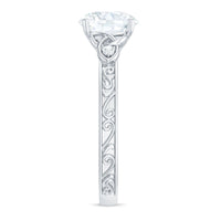 Antique-inspired round moissanite Celtic knot engagement ring by Rosec Jewels showcasing intricate design and sparkling center stone.