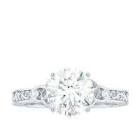 Antique round moissanite Celtic knot engagement ring with intricate design, crafted by Rosec Jewels, featuring detailed metalwork.