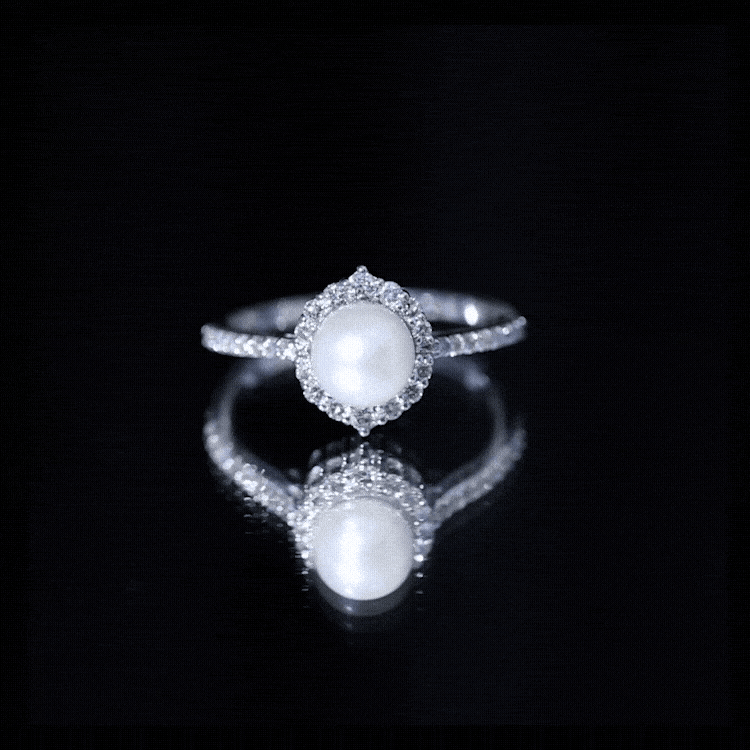 Freshwater pearl and diamond halo engagement ring from Rosec Jewels featuring a yellow gold band and intricate design.