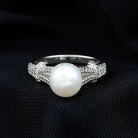 Rosec Jewels cultured 7.4-carat freshwater pearl engagement ring with lab diamonds, showcasing a elegant ring design and sparkling accents.