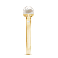 Natural 2 Carat freshwater pearl solitaire ring with diamond setting from Rosec Jewels, showcasing the elegant ring on a white background.