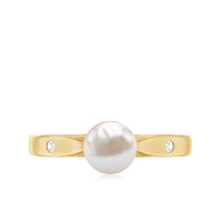 Natural 2 Carat freshwater pearl solitaire ring with diamond accents, featuring a rose gold band from Rosec Jewels.