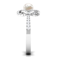 Freshwater pearl engagement ring with diamond accents by Rosec Jewels featuring a 2.50 CT pearl and sparkling side stones.