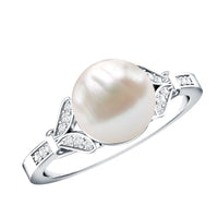 Rosec Jewels cultured 7.4 carat freshwater pearl diamond engagement ring with split shank design, showcasing elegant jewelry craftsmanship.