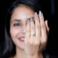 Rosec Jewels Lotus Basket Set cubic zirconia engagement ring with side stones, featuring intricate design and sparkling central stone.