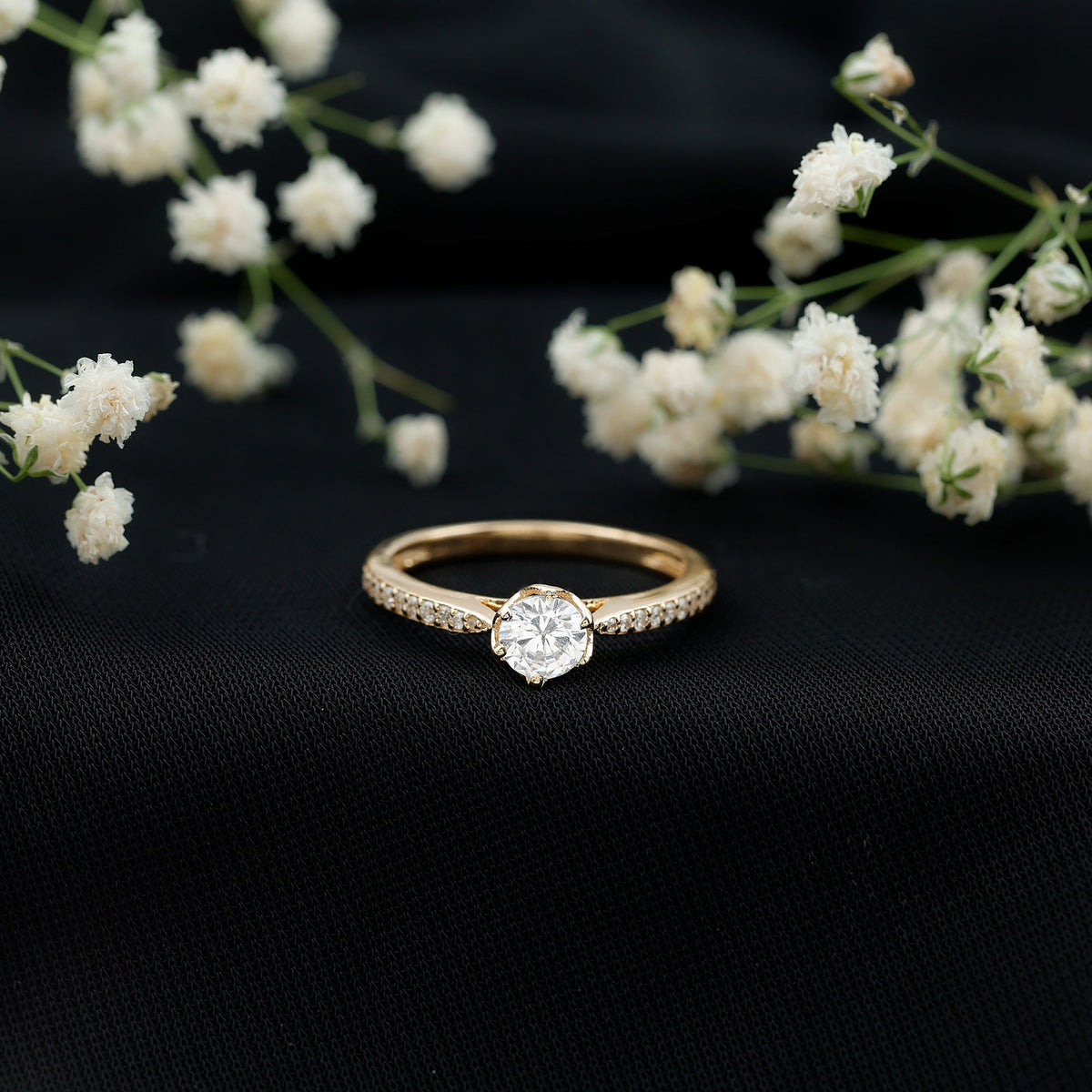 Rosec Jewels Lotus Basket Set cubic zirconia engagement ring with side stones, featuring a detailed floral basket design.