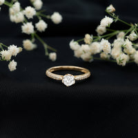 Rosec Jewels Lotus Basket Set cubic zirconia engagement ring with side stones, featuring a detailed floral basket design.