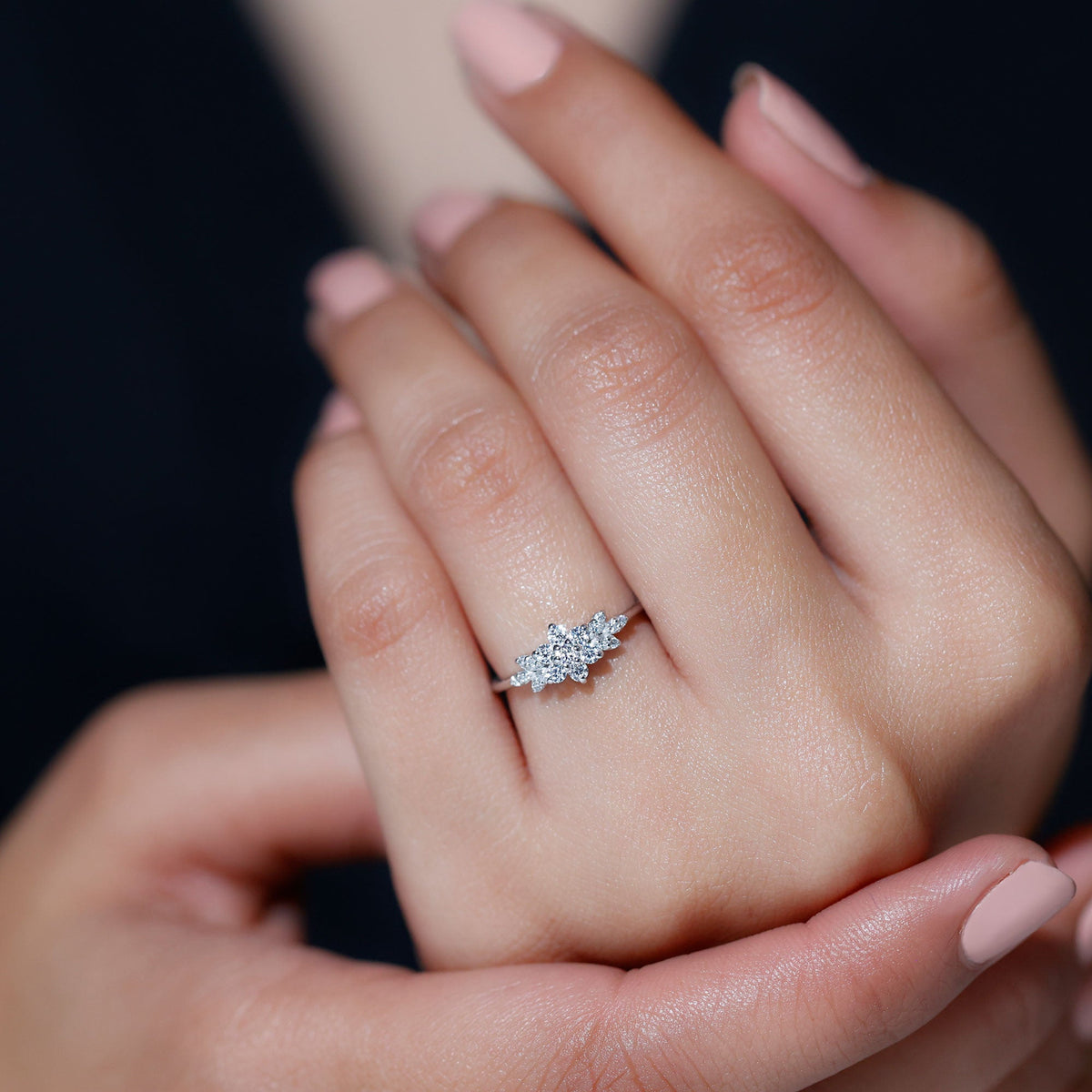 Cubic zirconia flower cluster engagement ring by Rosec Jewels featuring a sparkling floral design and silver band.