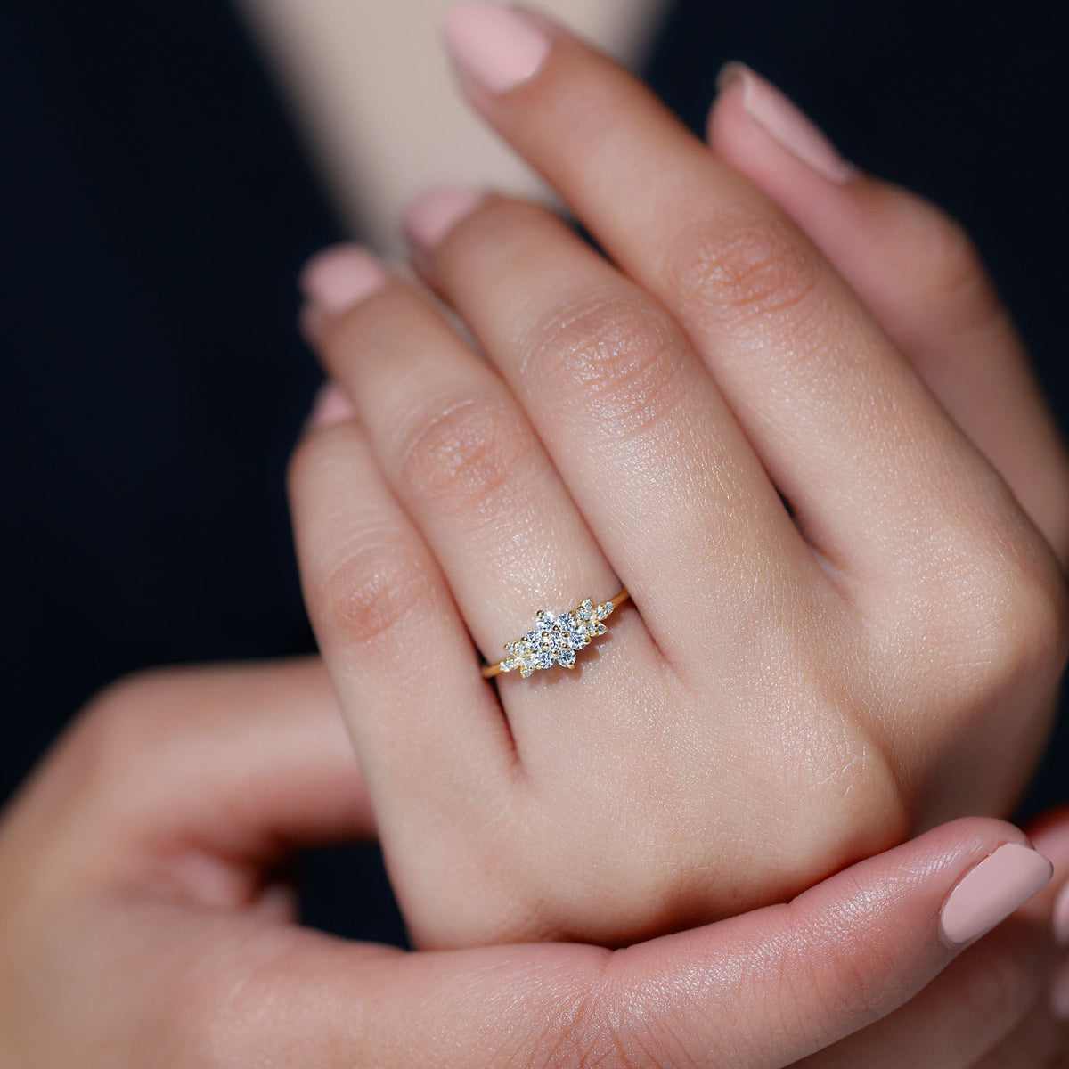 Rosec Jewels cubic zirconia flower cluster engagement ring with intricate floral design and sparkling stones on a silver band.