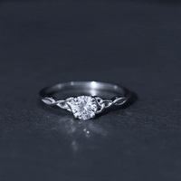 Rosec Jewels 0.5 carat solitaire cubic zirconia promise ring featuring a Celtic knot design, silver-tone and elegant craftsmanship.