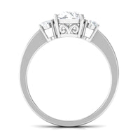 Round cubic zirconia three-stone engagement ring by Rosec Jewels, showcasing sparkling stones set in a polished band.