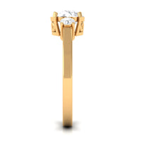 Round cubic zirconia three-stone engagement ring by Rosec Jewels with sparkling stones and polished silver band.