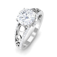 Rosec Jewels vintage-style solitaire 1 carat cubic zirconia engagement ring with intricate detailing and a central sparkling stone.