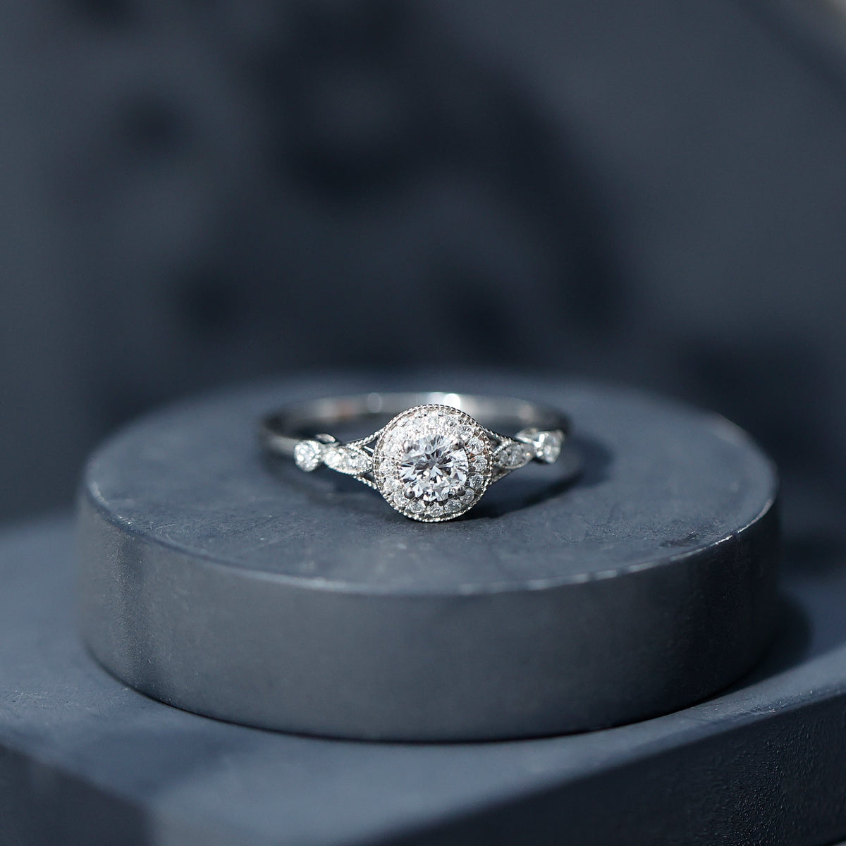 Antique-inspired zircon halo engagement ring by Rosec Jewels featuring a central gemstone with intricate vintage detailing