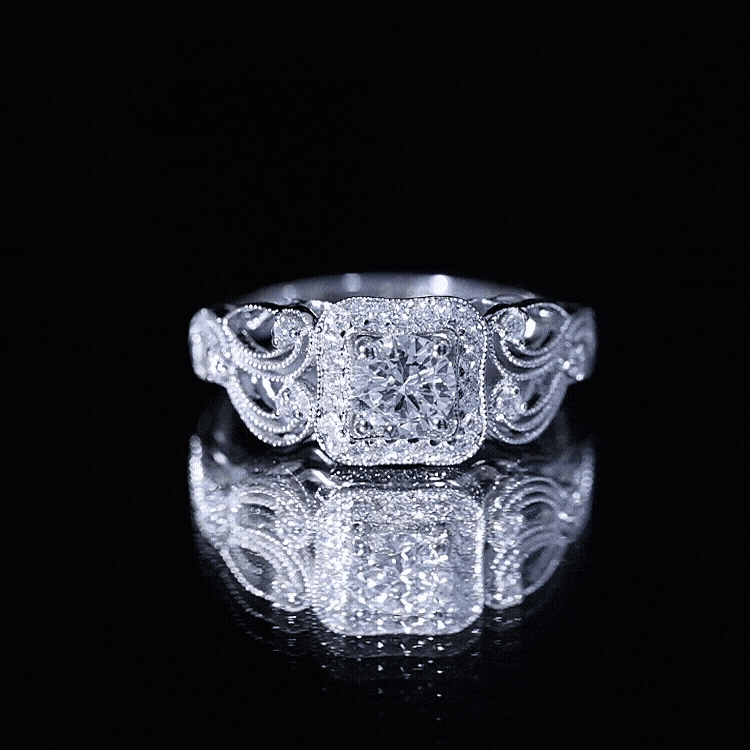 Vintage-inspired halo engagement ring by Rosec Jewels featuring yellow gold and a central zircon gemstone.