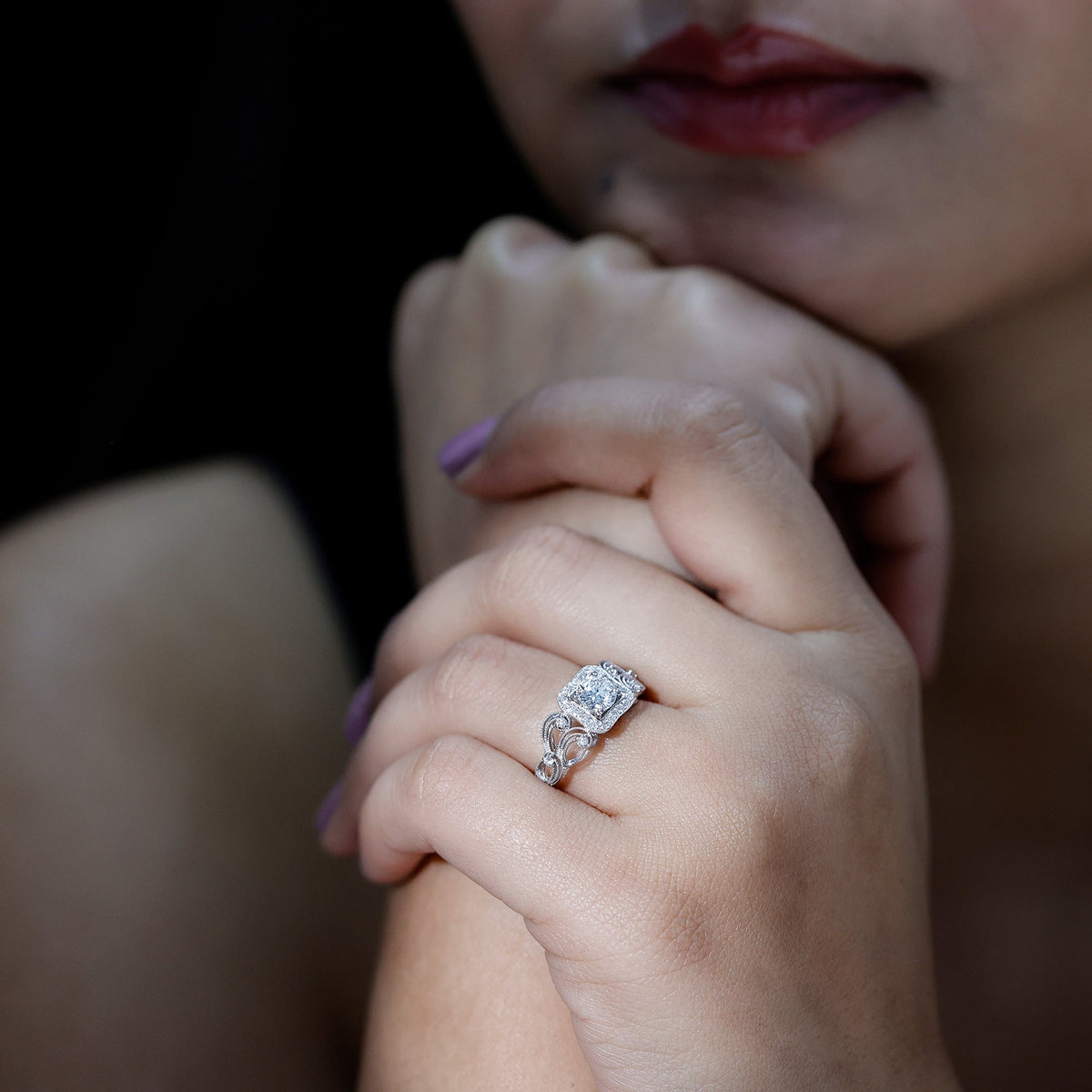 Vintage-inspired halo engagement ring by Rosec Jewels featuring a central zircon gemstone and intricate detailing.