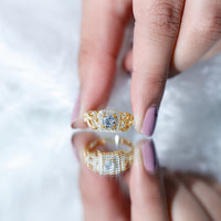 Vintage-inspired halo engagement ring featuring zircon stones, crafted by Rosec Jewels, with intricate detailing and sparkling center.