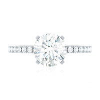 Rosec Jewels 2.75 CT zircon solitaire engagement ring with side stones, featuring a shiny central stone and intricate band detail.