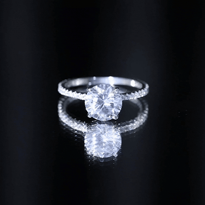 Yellow cubic zirconia solitaire engagement ring for women by Rosec Jewels featuring a 4.4 carat center stone and elegant band design.