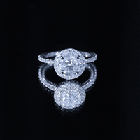 Silver cubic zirconia floating halo engagement ring by Rosec Jewels featuring a classic, elegant design with sparkling stones.