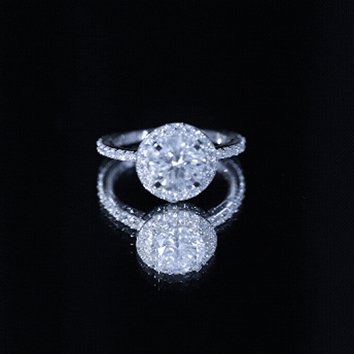 Yellow gold cubic zirconia floating halo engagement ring with a classic design, featuring shimmering stones and elegant craftsmanship.
