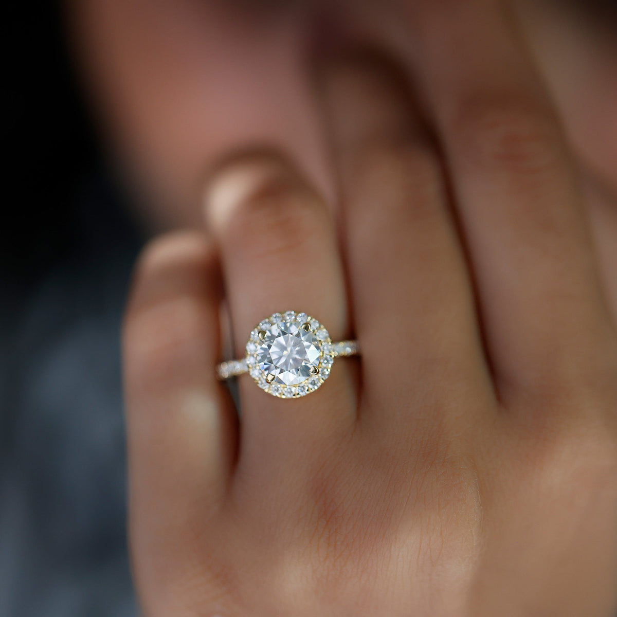 Elegant rose gold cubic zirconia floating halo engagement ring by Rosec Jewels, showcasing a sparkling central stone and intricate design.