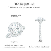 Rosec Jewels zircon round engagement ring with floating halo and side stones, showcasing intricate design and sparkling details.