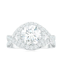 Two-carat round-shaped zircon crossover engagement ring from Rosec Jewels, featuring sparkling stones and a modern design.
