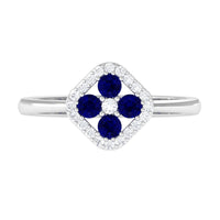 Blue sapphire cluster ring with diamond accents, featuring a 1/2 carat sapphire and sparkling diamonds in a Rosec Jewels ring.
