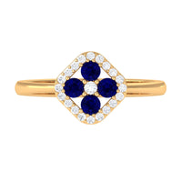 Rosec Jewels 1/2 CT blue sapphire cluster ring with diamond accents, showcasing a stunning blue sapphire centerpiece and sparkling side stones.