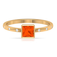 Rosec Jewels princess cut fire opal solitaire promise ring with diamond accents, showcasing a vibrant gemstone and elegant design.