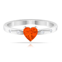 Rosec Jewels 1/2 Carat fire opal heart engagement ring with diamonds, showcasing a sparkling gemstone and delicate band.