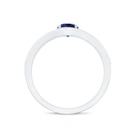 Created blue sapphire and diamond engagement ring by Rosec Jewels featuring a classic design with central blue sapphire and surrounding diamonds.