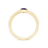 Created blue sapphire and diamond engagement ring by Rosec Jewels featuring a central blue sapphire and surrounding diamonds in a classic design.