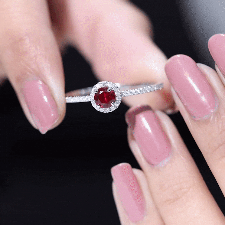 Lab-created 0.6 carat ruby engagement ring with diamond halo in rose gold by Rosec Jewels, showcasing the detailed design and sparkling stones.